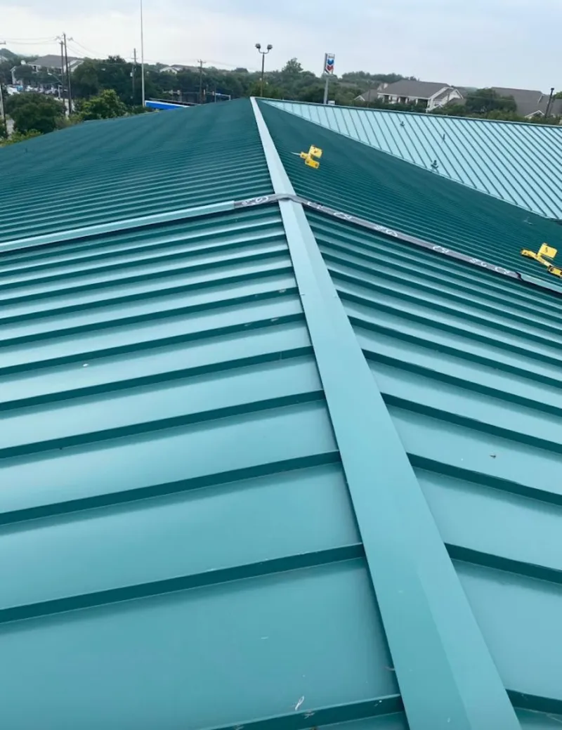 Green commercial metal roof ridge and valley for Metal Roof Repair in Reedley